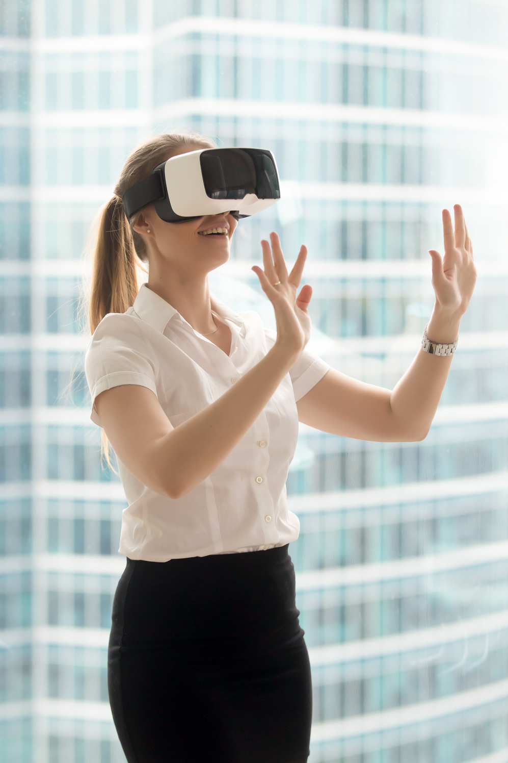 Businesswoman enjoying virtual tour in VR headset